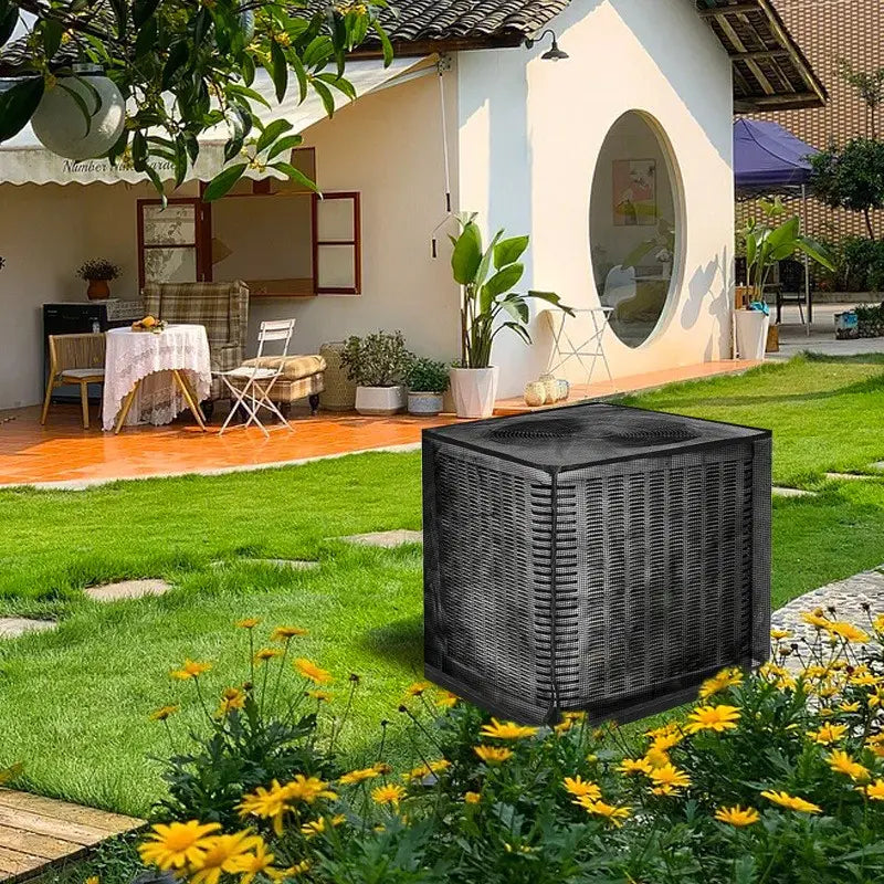 Mesh AC cover installed beside a garden