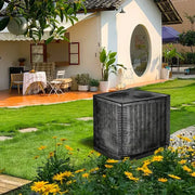 Mesh AC cover installed beside a garden