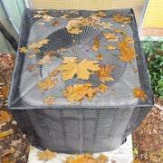Mesh cover catching fallen leaves